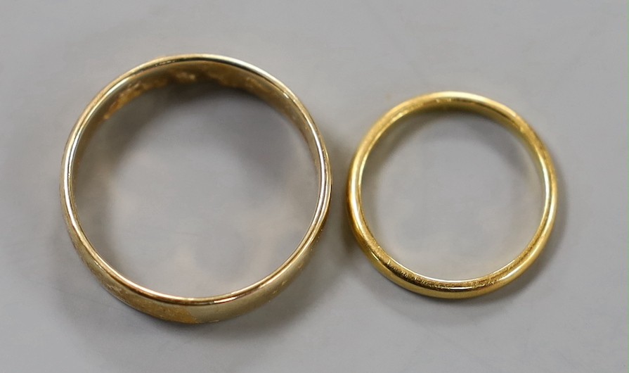 A 9ct gold wedding band, 3.8 grams and a small 22ct gold wedding band, 2.4 grams.